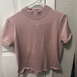 Calvin klein blush pink top size medium 
Only worn once
Great condition